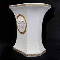 Rosenthal Versace Gorgona vase, of rectagular form with fluted base and rim, decorated in relief with medusa masks and gilt greek key borders upon a white ground, boxed, H19cm