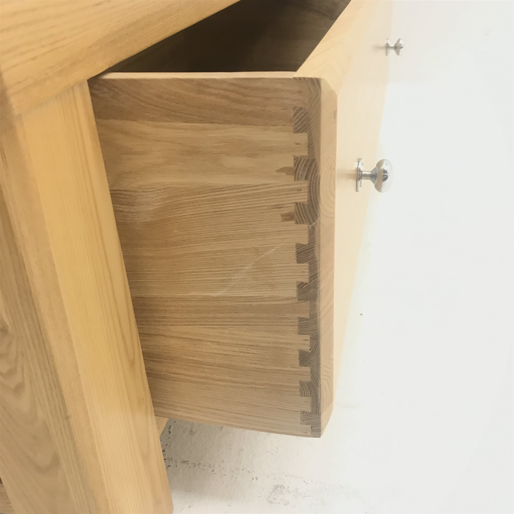 Solid oak wardrobe, two doors enclosing hanging rail above single