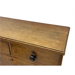 Georgian oak chest, fitted with two short over three long drawers, with ebonised turned handles 