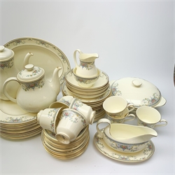Royal Doulton Juliet pattern dinner and tea wares, comprising thirteen dinner plates, twelve dessert plates, thirteen side plates, twelve soup bowls, twelve further bowls, two tureen and covers, serving platter, two sauce boats and stands, teapot, hot water pot, thirteen teacups and fourteen saucers, two jugs, and an open sucrier. 