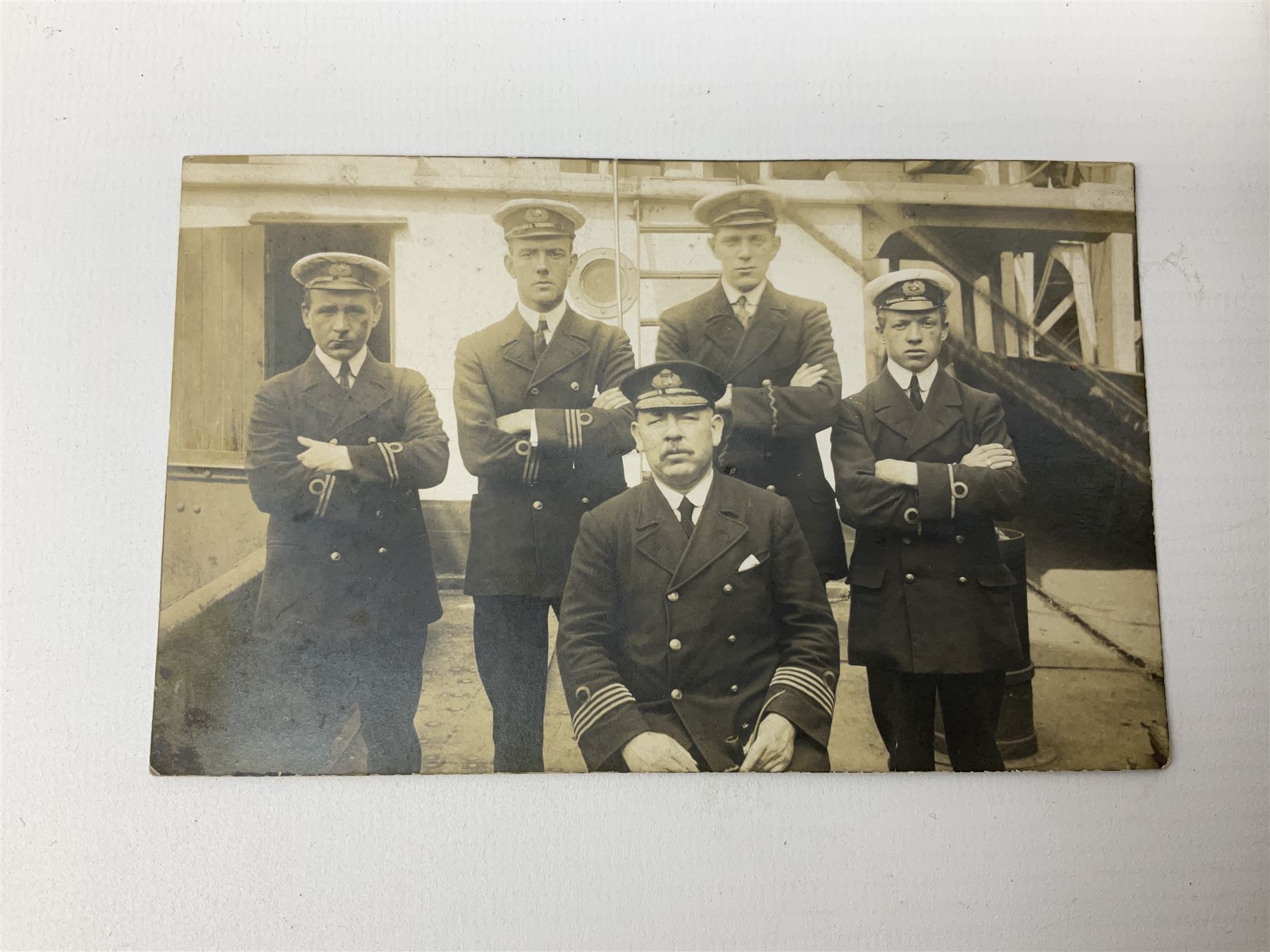 Trinity House Hull - hallmarked silver medal commemorating the visit of the Prince of Wales October 13th 1926; photograph of Captain J. Collins Warden 1934-35; photographic postcard of Capt. Collins onboard ship with other crew members; and six Trinity House uniform buttons