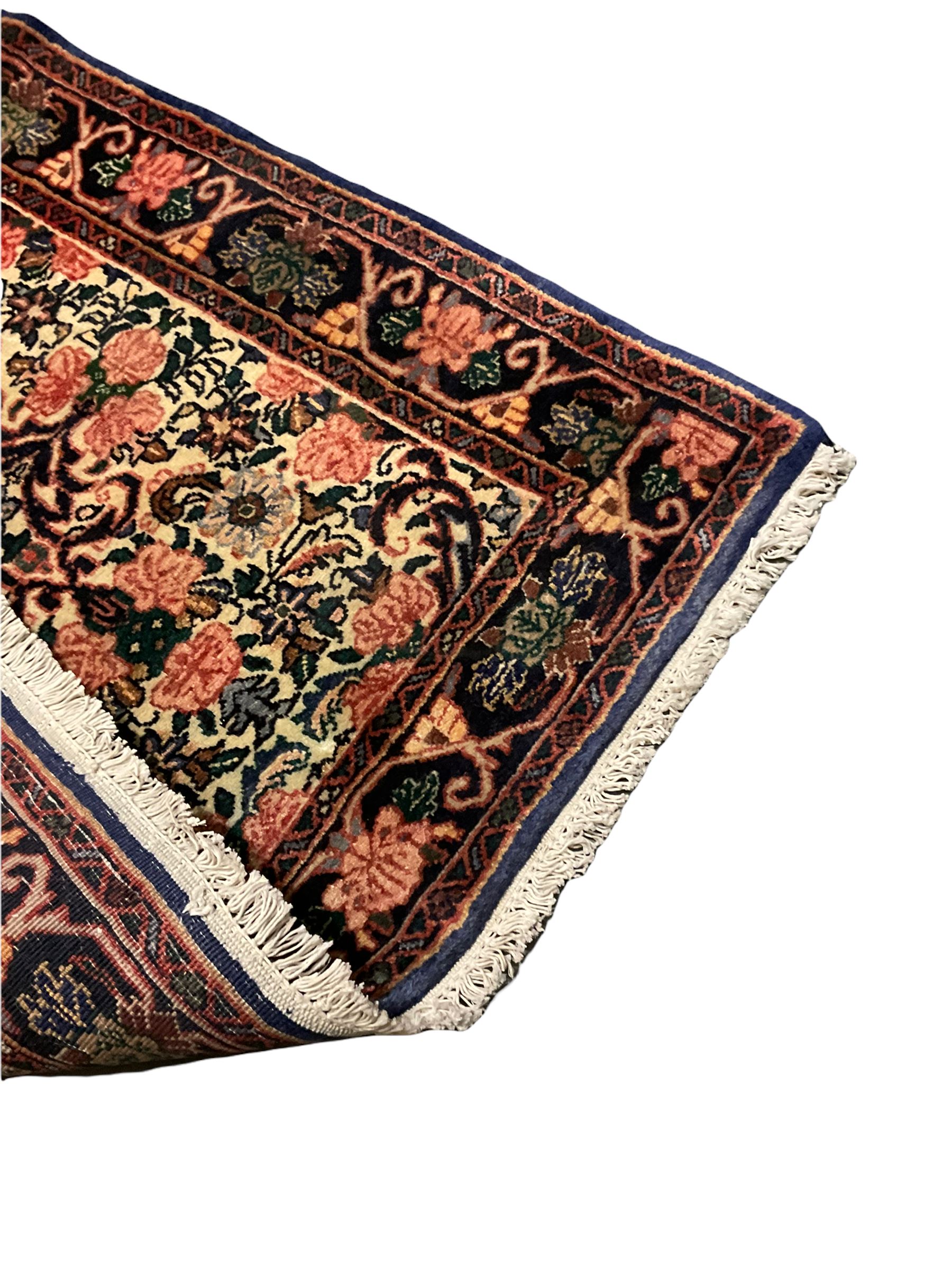 Persian Zanjan rug, pale ground and decorated with floral Herati motifs