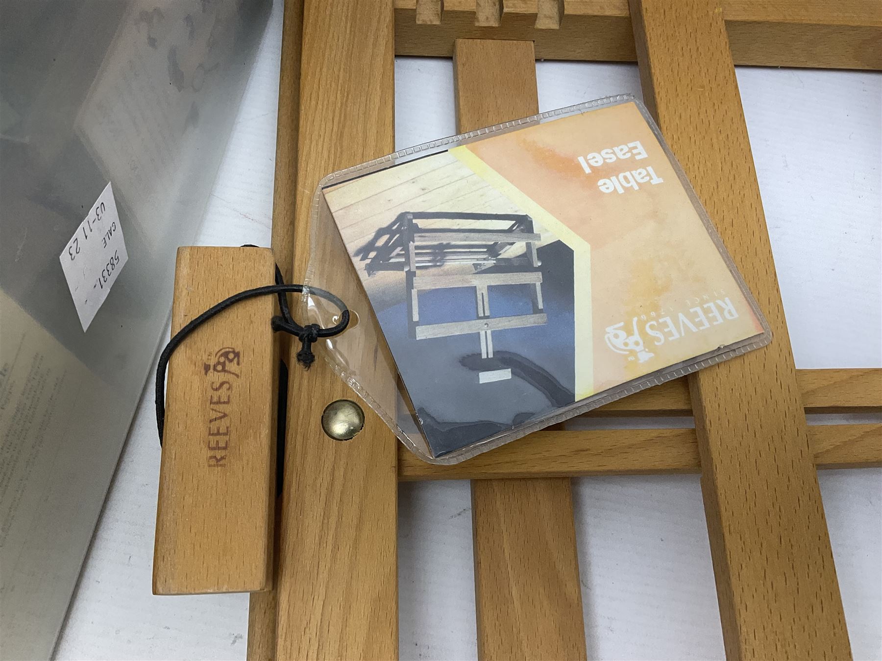 Chatsworth box easel, together with a Reeves table easel, collection of Wentworth jigsaw puzzles and two picnic baskets