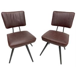 Barker & Stonehouse - pair of 'Sawyer' swivel dining chairs, upholstered in dark maroon leather, on splayed metal supports