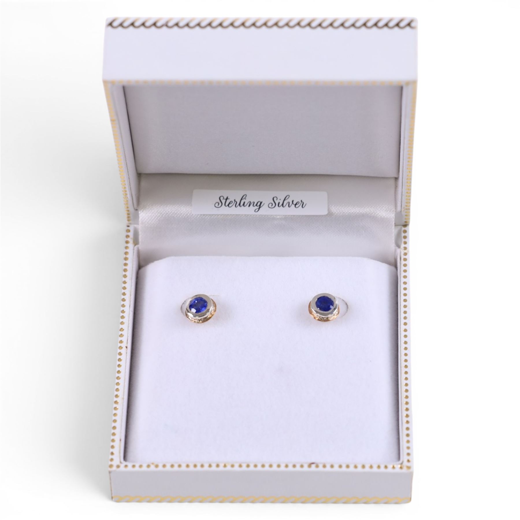 Silver and 14ct gold sapphire stud earrings, boxed