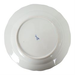 Four early 20th Century Meissen plates, hand painted with floral sprays, sprigs and inspects, with underglaze blue cross sword mark beneath, D21.5cm