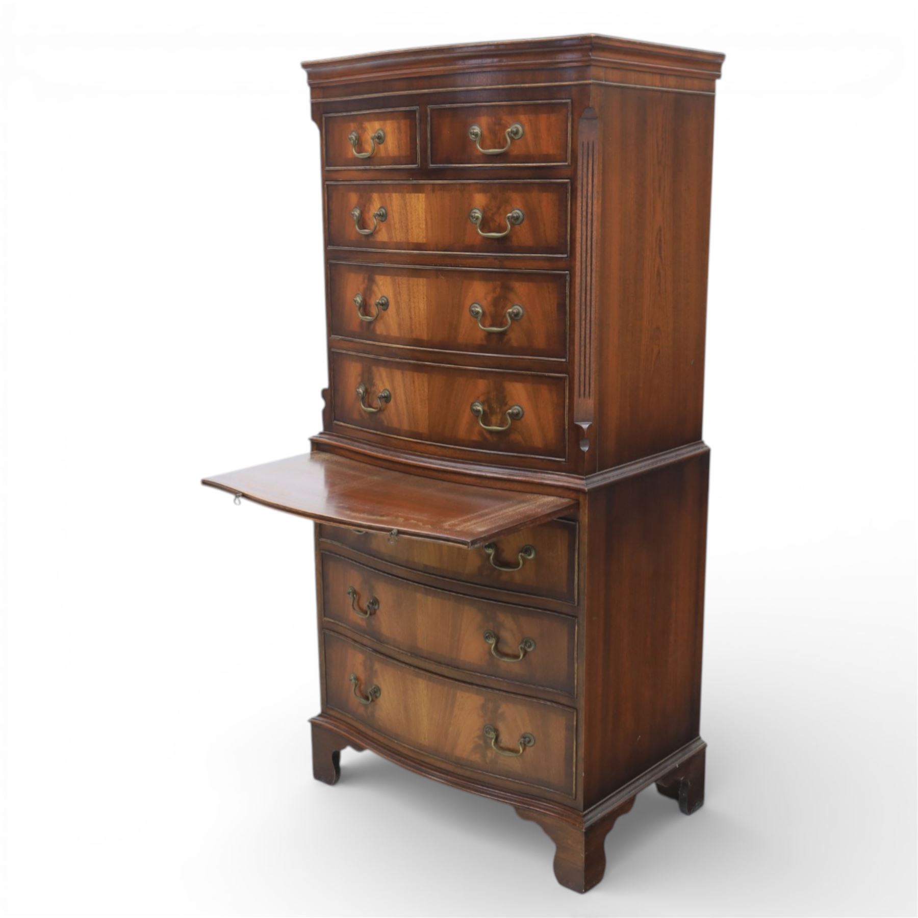 Reprodux - Georgian design mahogany serpentine chest-on-chest, top section with two over three drawer arrangement, flanked by chamfered edges, the lower fixed section, with slide above three drawers, raised on bracket feet  
