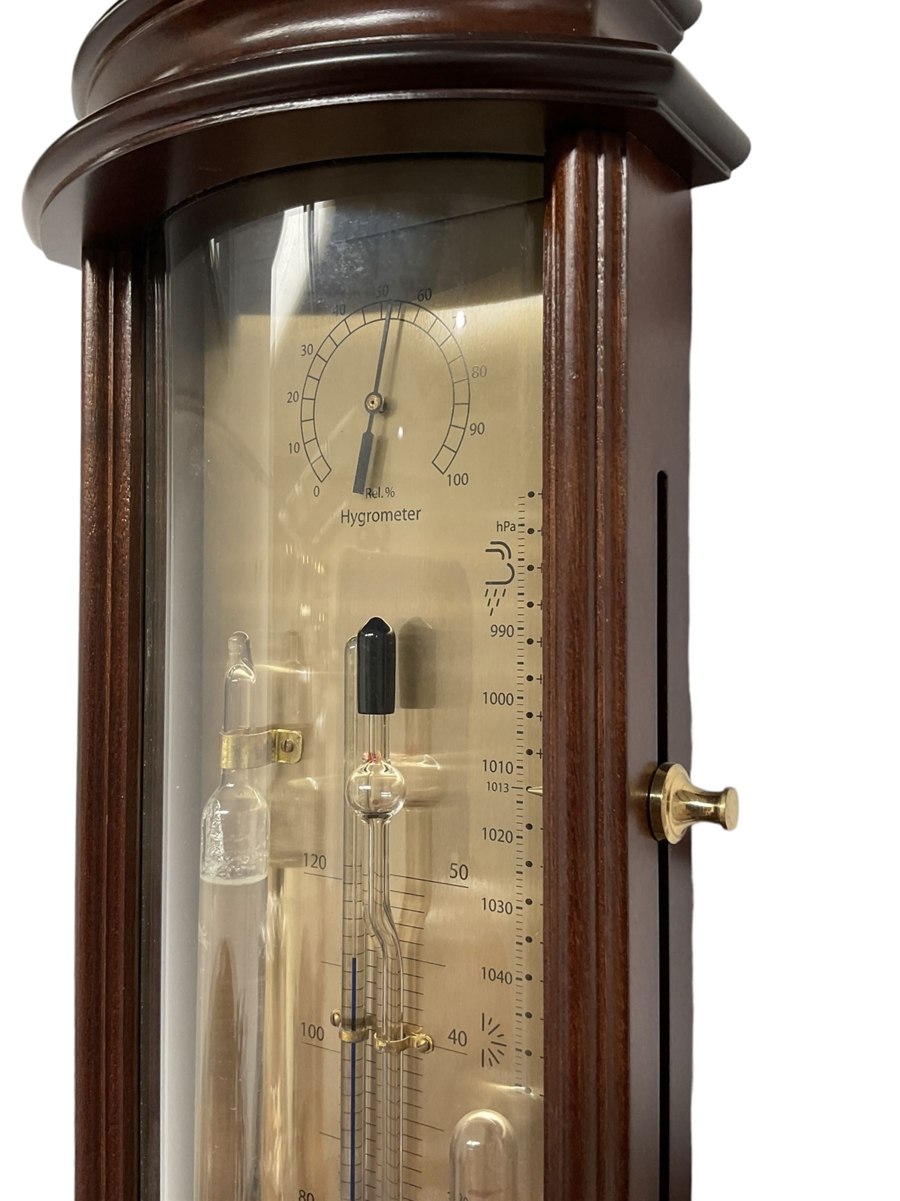 20th century Tendency Barometer -  to the design of Alexander Adie the 19th century inventor of the Sympiesometer, in a mahogany convex case with astragal moulding to the top and base, with an engraved silvered register, spirit thermometer, comparison Sympiesometer bulb and storm glass, adjustable vernier and hygrometer.
