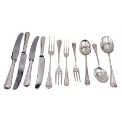 Modern silver cutlery for two place settings, to include table and dessert forks, silver handled table and dessert knives and two dessert spoons, all hallmarked Cooper Brothers & Sons, Sheffield 1966, together with a mid 20th century table spoon, hallmarked Garrard & Co Ltd, Sheffield 1955, contained within a Town Talk cutlery wrap 