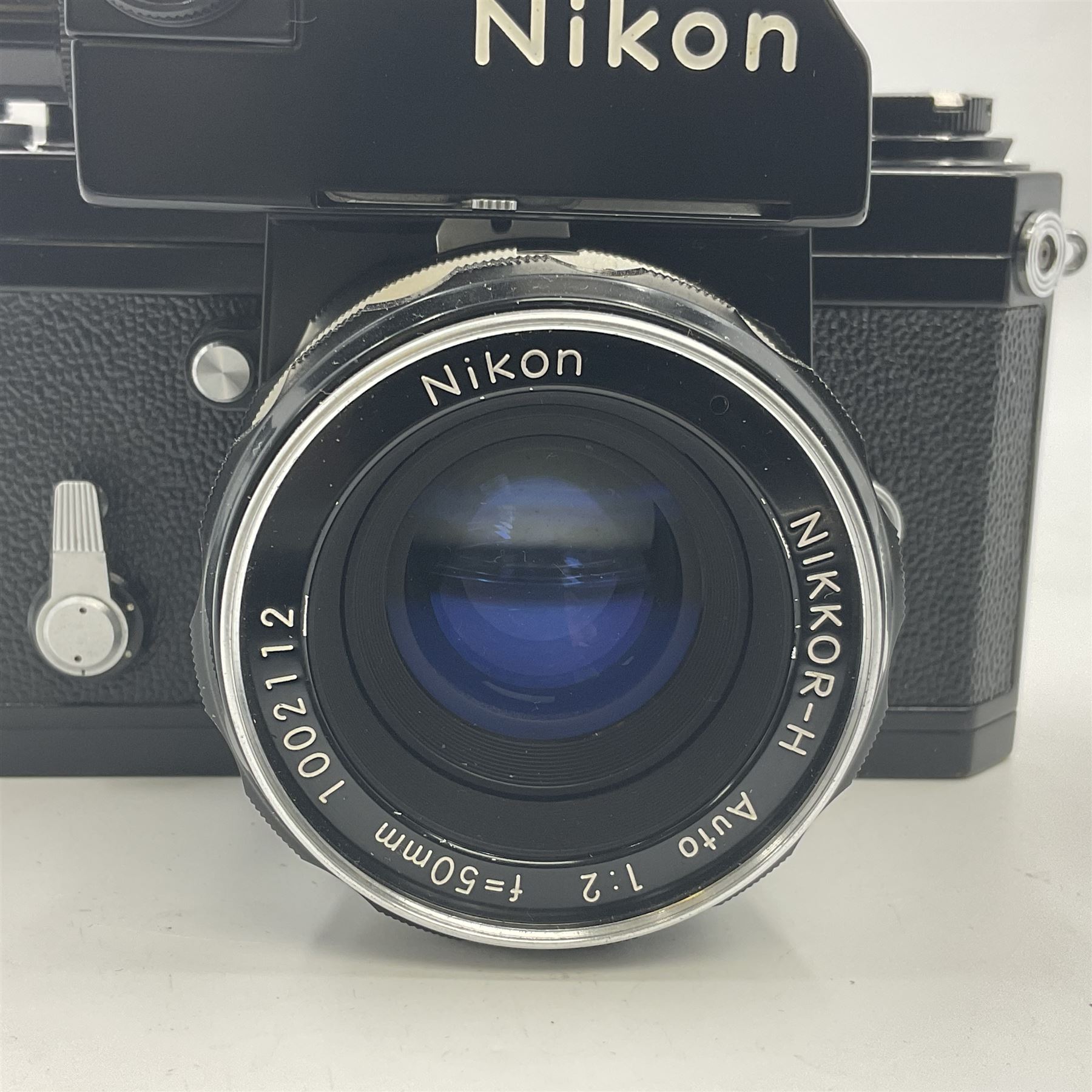 Nikon F Photomic camera body, serial no. 6543350, circa 1964, with 'Nikon NIKKOR-H Auto 1:2 f=50mm' lens, serial no. 1002112