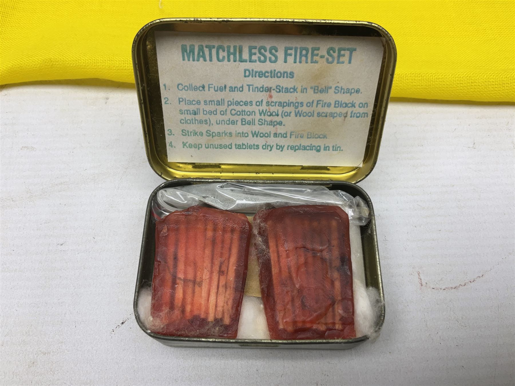 Miscellaneous militaria including two Royal Artillery and one Royal Horse Artillery stable belts; Northamptonshire Regiment trench art brass shell case lighter; unused Matchless Fire-Set; pocket knives and multi-tool; lanyards; oak shield with York & Lancaster crest etc