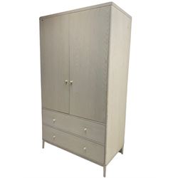 Ercol - 'Salina' wardrobe enclosed by two doors, fitted with two long drawers