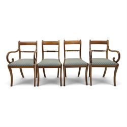19th century mahogany extending dining table, rectangular top with rounded corners raised on turned and fluted supports with brass cups and castors, with two additional leaves; with set of eight (6+2) Regency design mahogany dining chairs, spiral-reeded back-bar over drop-in seats and sabre supports (W54cm H85cm)