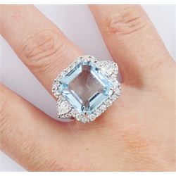 18ct white gold octagonal mixed cut aquamarine, round brilliant and pear cut diamond ring, stamped, 750, aquamarine 8.60 carat, total diamond weight 1.24 carat, with World Gemological Institute report