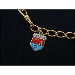 9ct rose gold curb link charm bracelet with yellow gold clip and four 9ct gold charms including, horseshoe, clown, bananas and enamel Scarborough charm