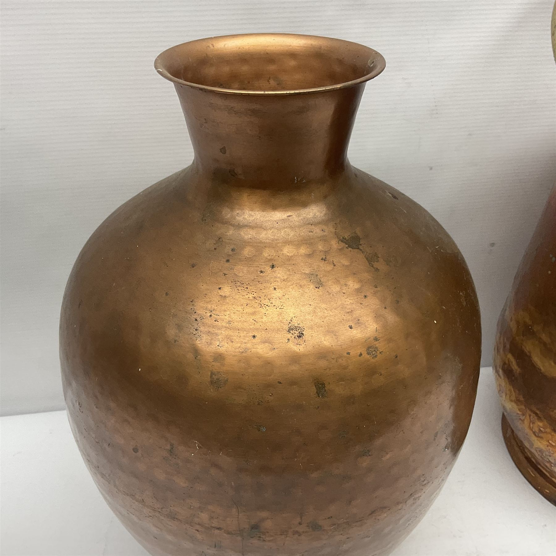 20th century brass carriage lantern, with six glass panels and eagle finial, together with a copper coal scuttle and hammered copper vase, lantern H77cm