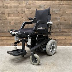 Permobil LSA Lifestand seated and standing wheelchair