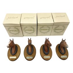 Beswick set of horse head wall plaques 'Champions all', comprising Arkle no.2700, The Minstrel no.2701, Red Rum no.2702, Troy no.2699, all with original boxes