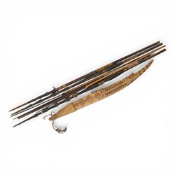 Papua New Guinea tribal fishing spears, together with carved boat 