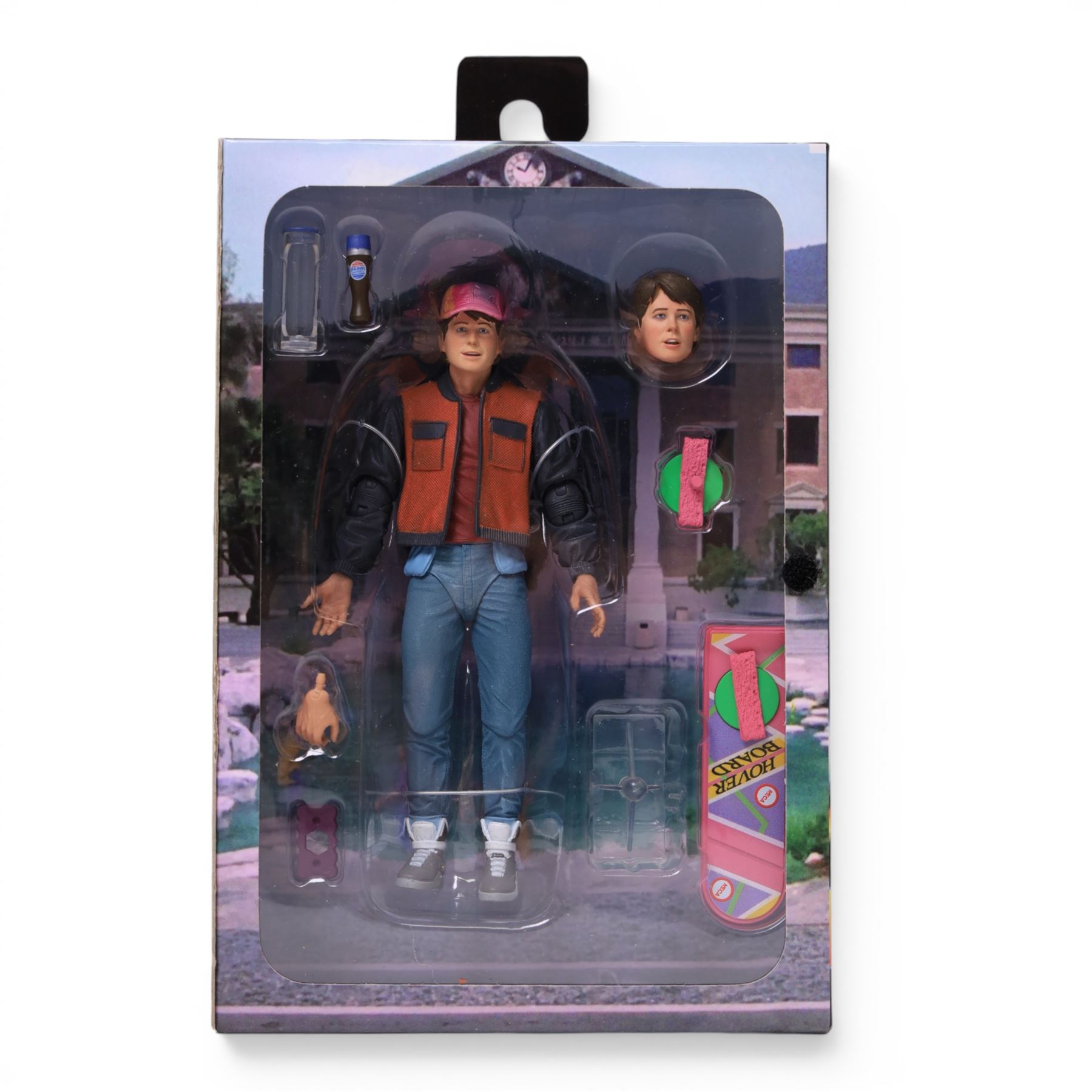 Neca Back to the Future Marty Mcfly figure, AMT Ghostbusters Ecto-1A 1:25 scale model kit and Vinyl Idolz Egon Spengler figure, all boxed