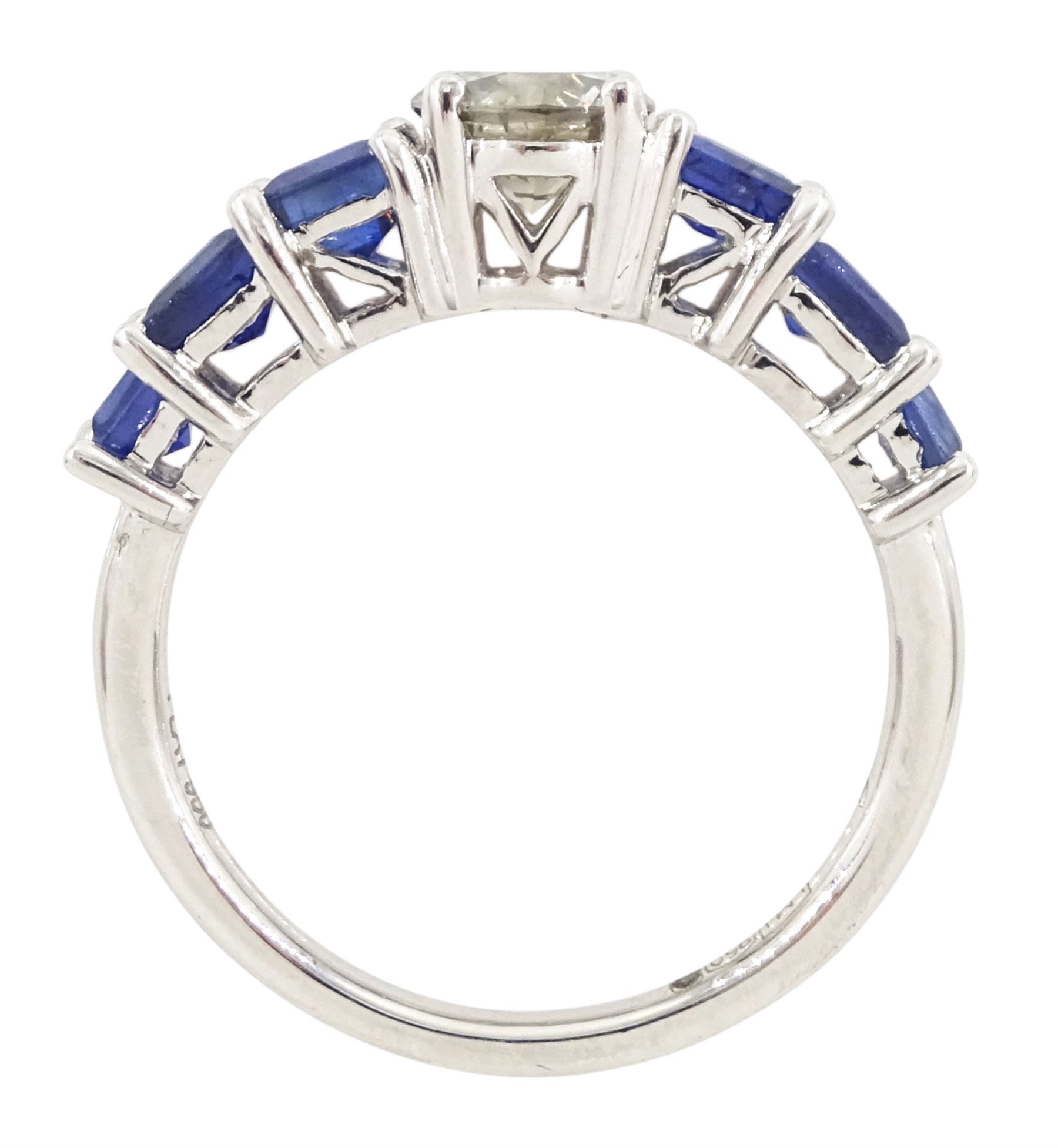 Platinum seven stone diamond and sapphire ring, the principal round brilliant cut diamond of approx 0.70 carat, with three princess cut sapphires set either side, hallmarked, total sapphire weight approx 1.95 carat