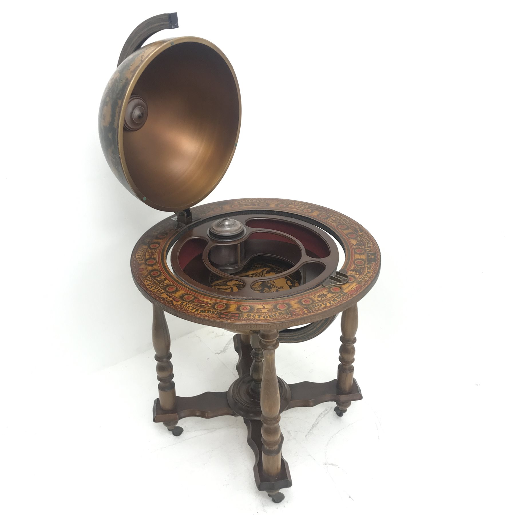 Globe drinks cabinet, turned supports joined by shaped stretchers, D74cm, H105cm