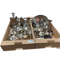 Group of silver plated wares, mostly comprising various tea wares, including teapots, coffee pot, hot water pots, plus various cream and mik jugs, sauce boats, candlestick, oval serving dish, swing handled basket, etc., in two boxes 