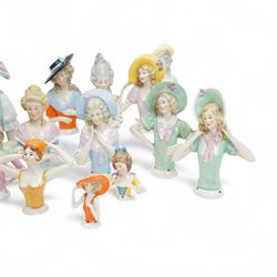 Collection of early 20th century ceramic half dolls, approximately 25