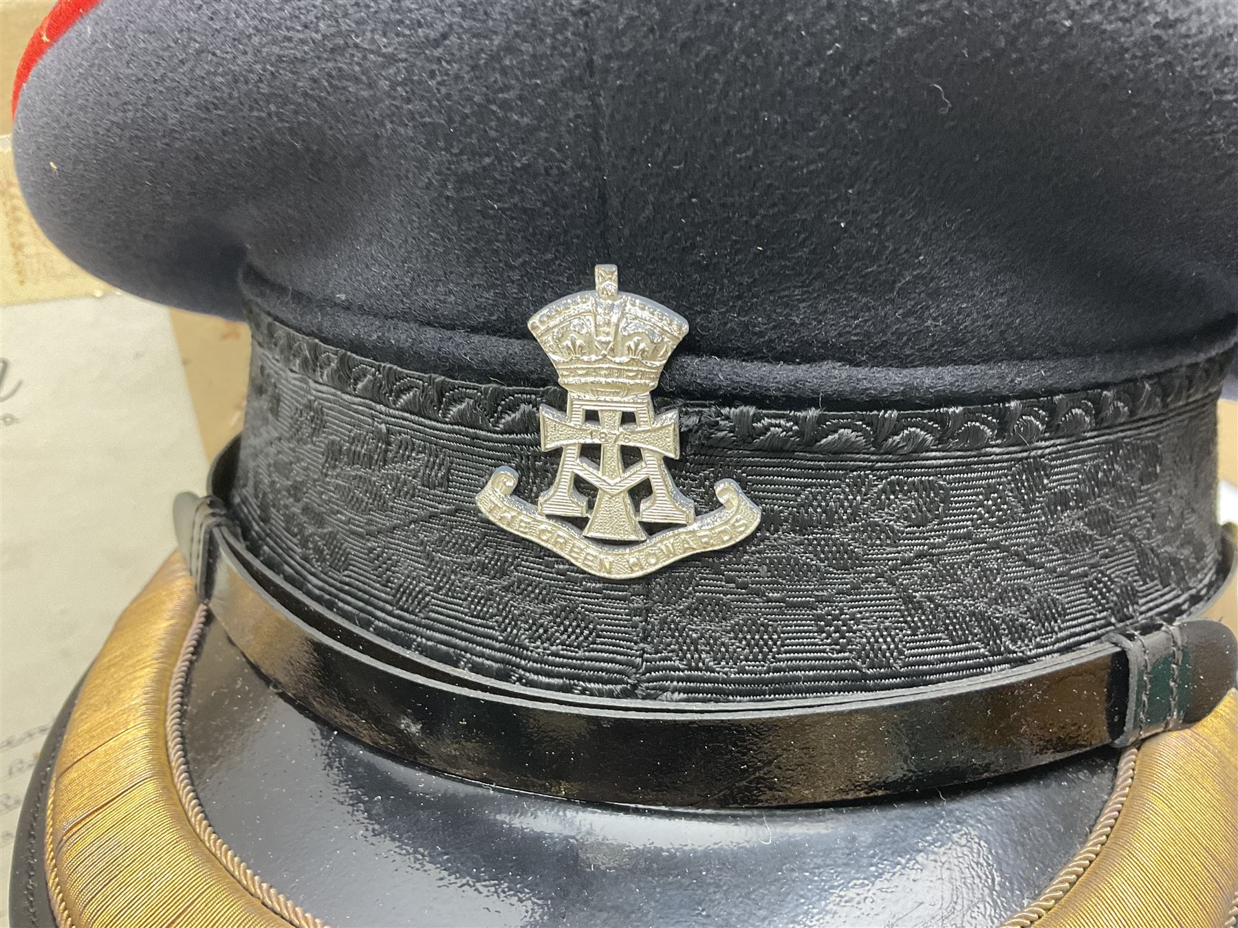 Officer's pattern peaked cap of the Green Howards, by Herbert Johnson, New Bond Street, London, in original box