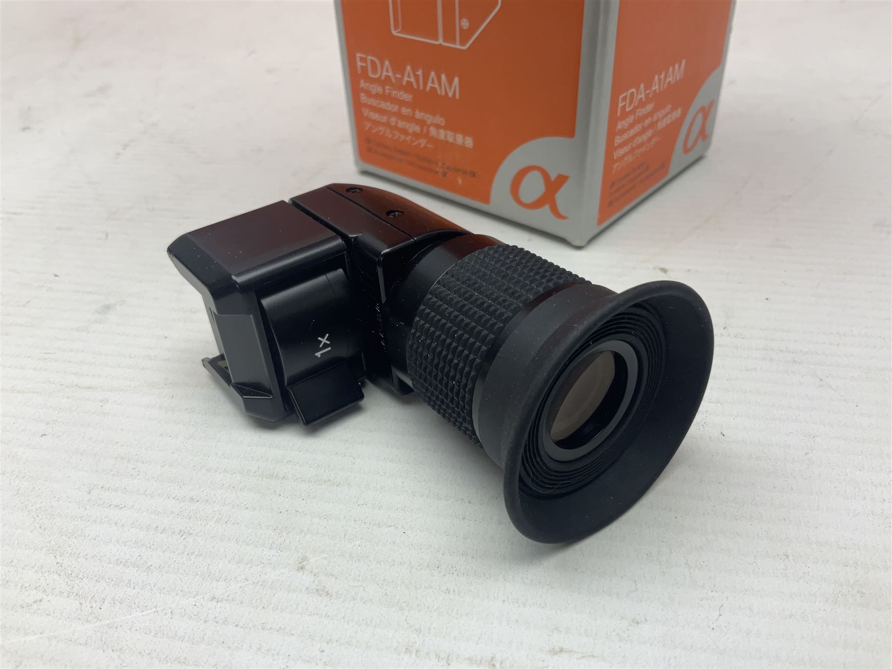 Sony Alpha A700 camera body, serial no 2340937, Sony Alpha A77 camera body, serial no 0715406, together with Sony angle finder and two firm holding grips, all with original boxes  