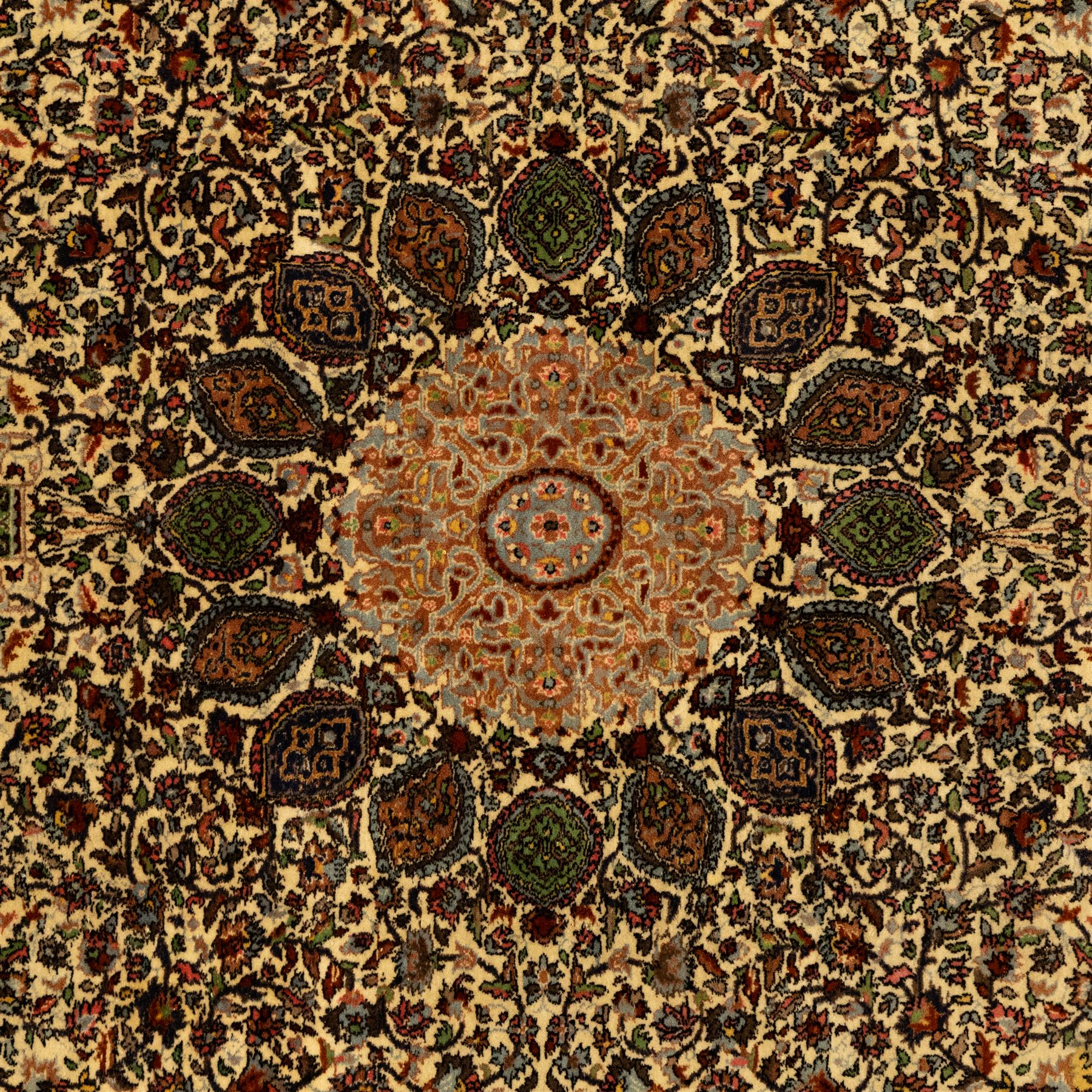 Persian Nain hand-knotted rug, central circular medallion with radiating floral scrolls and palmettes enclosed by ivory field with boteh and foliate motifs, framed by a series of guard stripes and a main border with scrolling arabesques in a midnight blue ground 