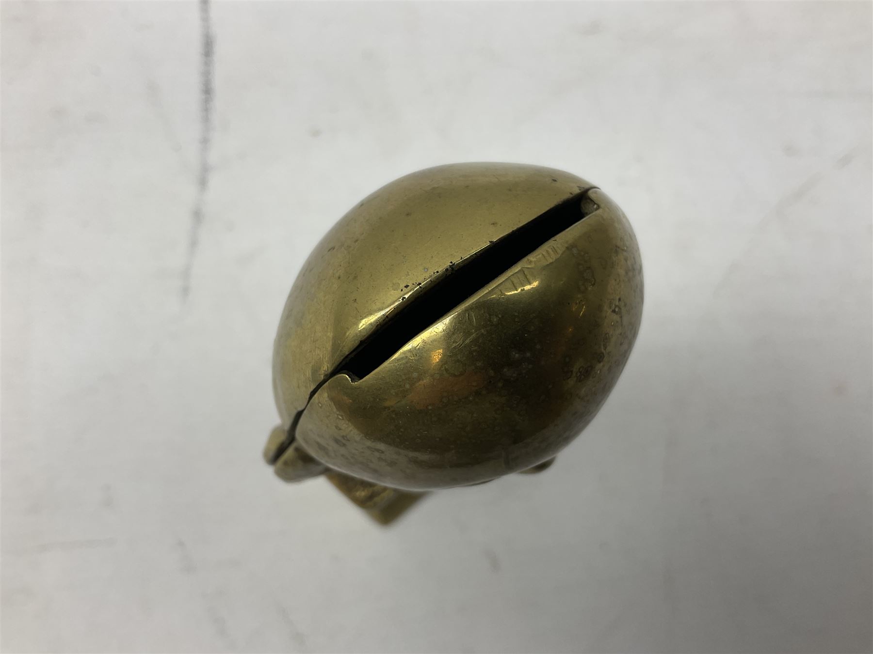 Brass money box in the form of Humpty Dumpty, H14.5cm