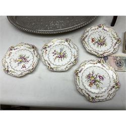 Set of four Dresden dessert plates hand painted with flowers and gilt scrolls, together with silver plate serving dish, a mahogany folding cake stand and a collection of coins