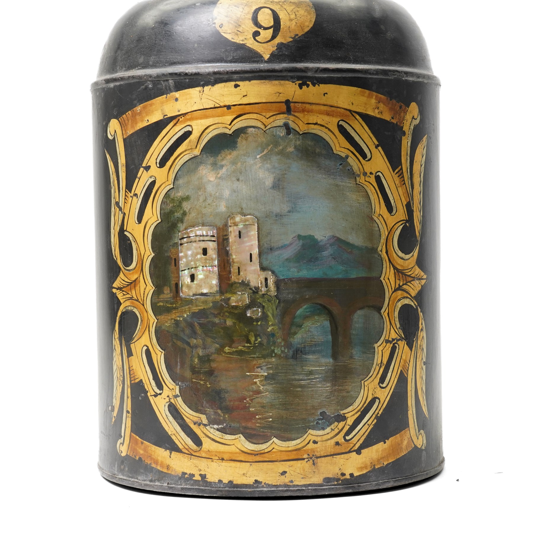 Regency period black toleware canister, painted with a scene of a castle with mother of pearl inlay, within painted gilt border, H39cm 