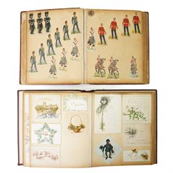 Victorian greetings card album and a scrap book with military and other scraps (2)