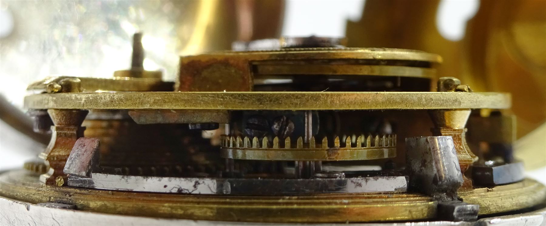 18th century silver and tortoiseshell quadruple cased verge fusee pocket watch by Graham, London, square baluster pillars, pierced and engraved balance cock, signed white enamel dial with Roman numerals and Fleur de Lys decoration, tortoiseshell third outer case with pique work to the borders, in a fitted later white metal fourth case