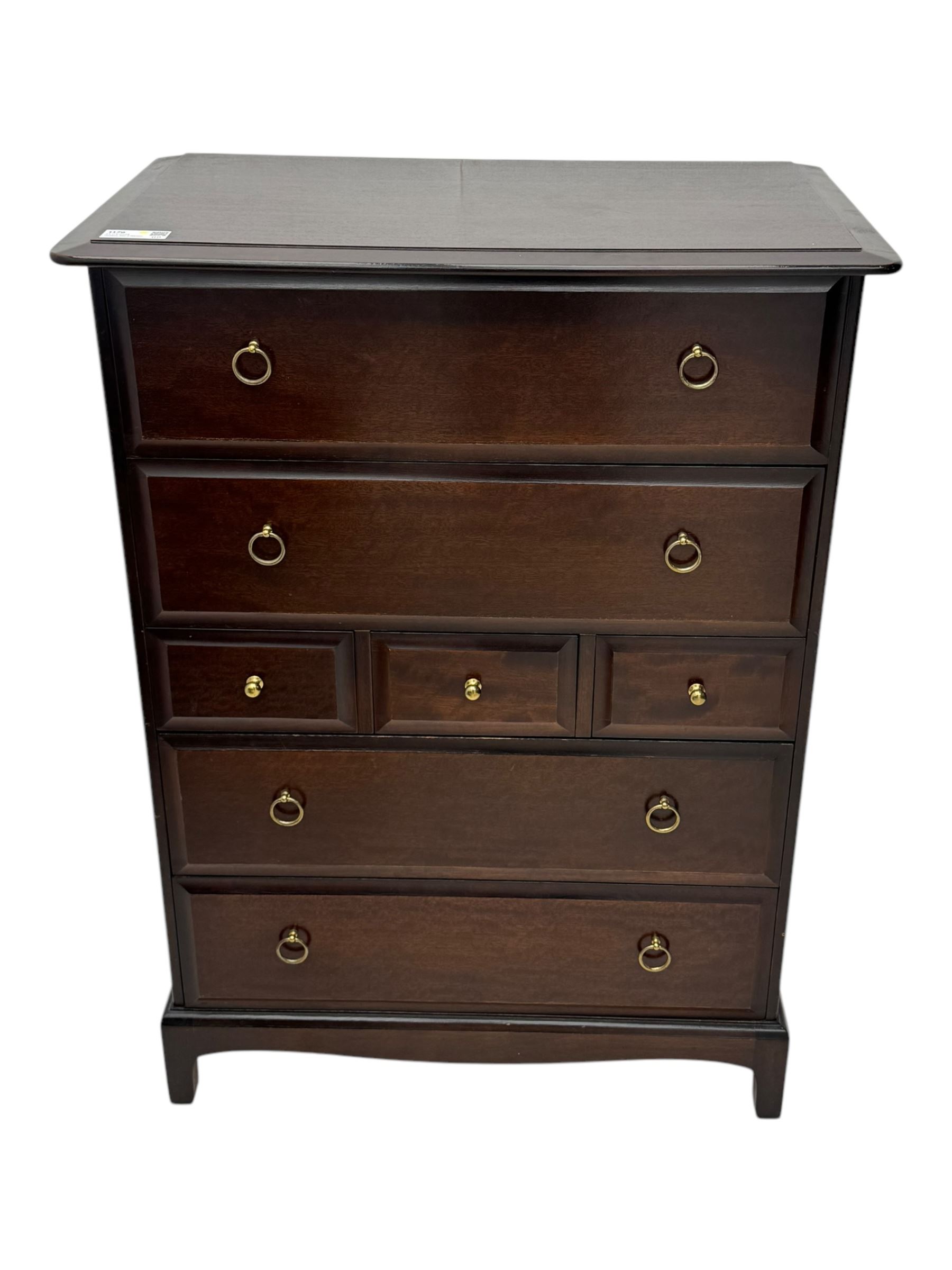 Stag Minstrel - mid-20th century chest, rectangular top over arrangement of three short and four long drawers, on bracket feet