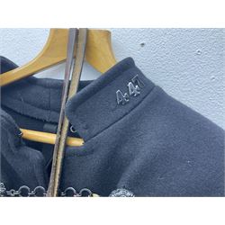 Police Constabulary style uniform items comprising woollen night cape / cloak with chain fastening, helmet and truncheon
