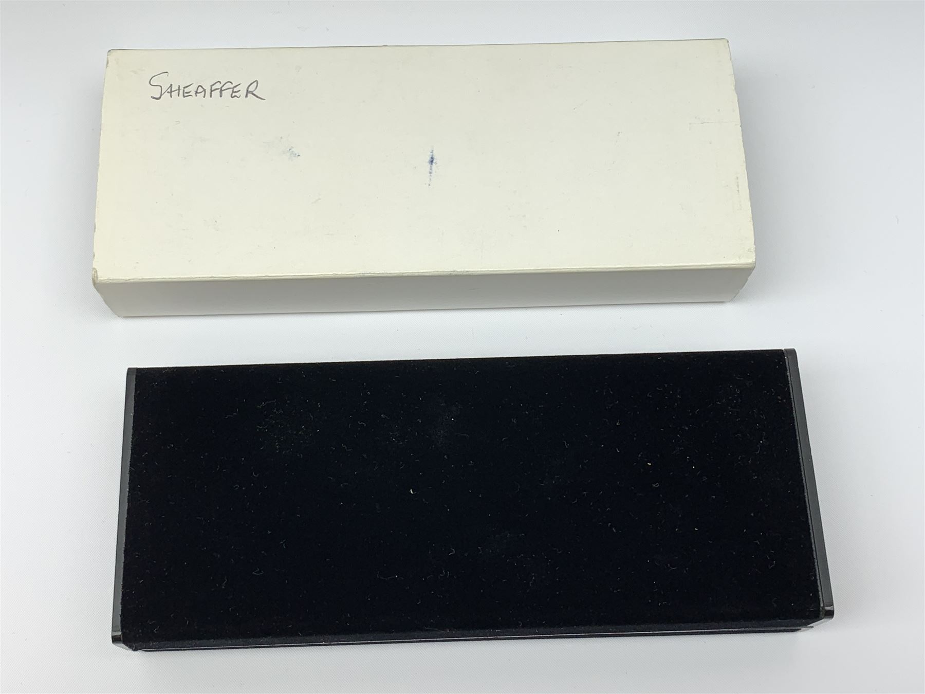 A Sheaffer Imperial Triumph fountain pen, the electroplated body with vertical band decoration, and nib marked 14K 585, together with a further Sheaffer fountain pen, with similarly decorated electroplated body, and nib marked 14K, in unassociated case. 