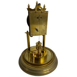 Gustav Becker - German Urania torsion clock with a glass dome, late 19th century 400-day movement with an enamel dial, arabic numerals and steel spade hands, movement supported by two brass pillars on a circular base, adjustable rotating pendulum with torsion suspension intact. With Key.
