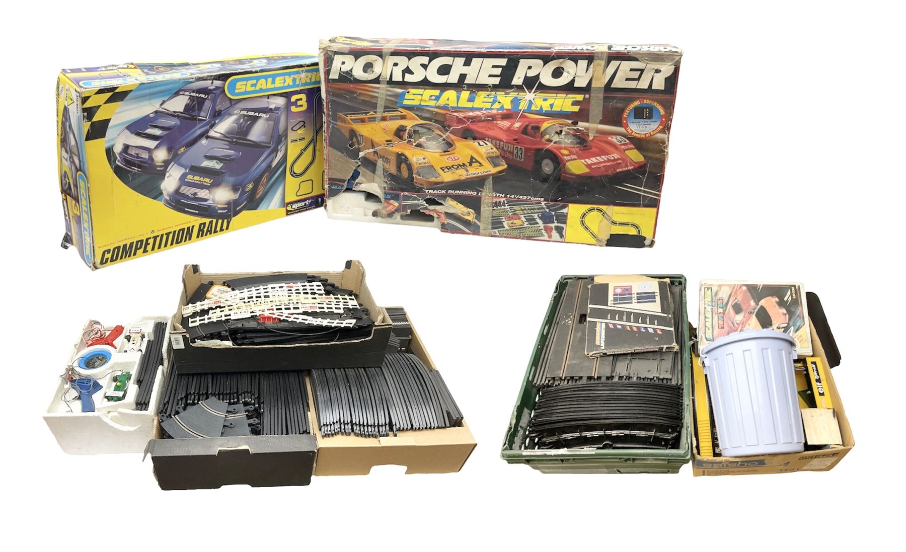 Scalextric - Porsche Power Set; boxed; Subaru Competition Rally Set (track and controllers only); boxed; Formula 1 Racing Car Set; polystyrene box base only; together with large quantity of track in four boxes; and quantity of accessories including vehicles, part vehicles for spares or repair, fencing, bridge, spare controllers etc