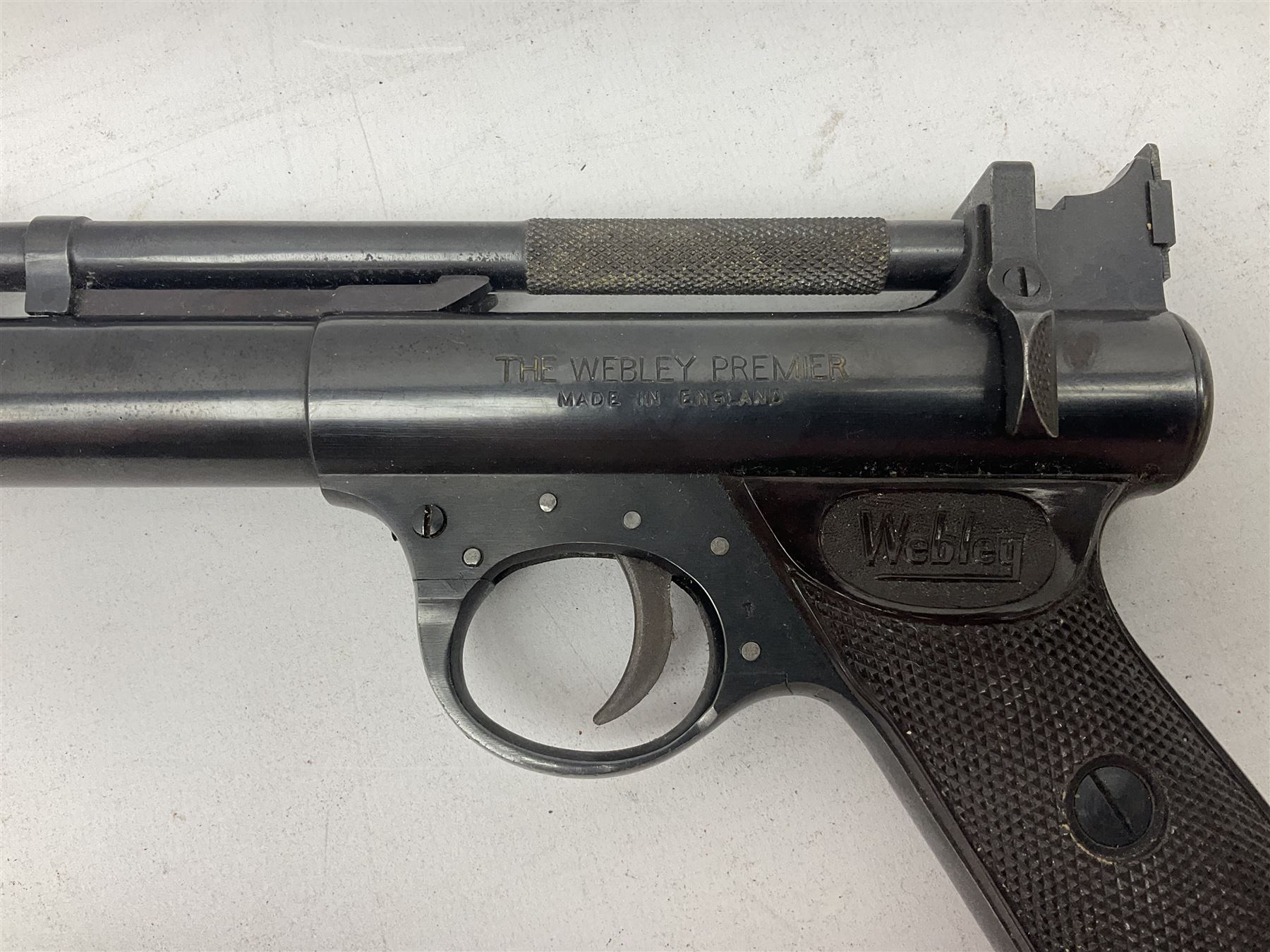 Webley Premier .22 air pistol with over lever action No.902 L24cm; and quantity of .22 pellets in two tins