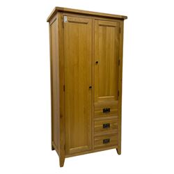 Light oak combination wardrobe, fitted with full-height compartment, single cupboard and three small drawers