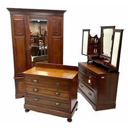 Edwardian walnut three piece bedroom suite comprising of a wardrobe with projecting cornice, single bevel edge mirrored door above drawer, shaped plinth base (W129cm, H204cm, D52cm) a raised mirror back dressing chest with six graduating drawers, shaped plinth base (W160cm, H171cm, D48cm) and a chest of drawers, raised shaped back, three drawers, shaped plinth base (W101cm, H93cm, D51cm)