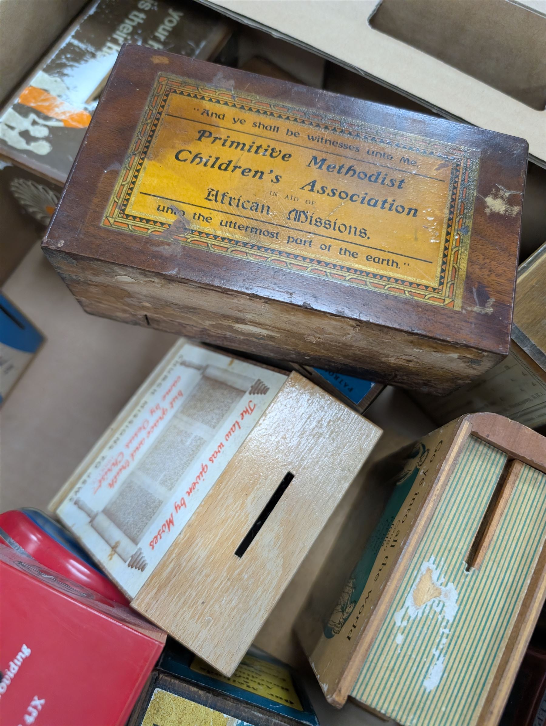 Large collection of vintage money boxes and charity boxes, including plastic, wooden, tin and ceramic examples, of various designs including Paddington, Dunlop, Jellybabies, Meerkat, Halifax Houses, Pigs, etc