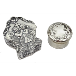  Dutch silver trinket box with embossed cherub and scroll decoration import marks Maurice Freeman London 1901, 7cm and an Art Nouveau circular pill box 3.1oz  