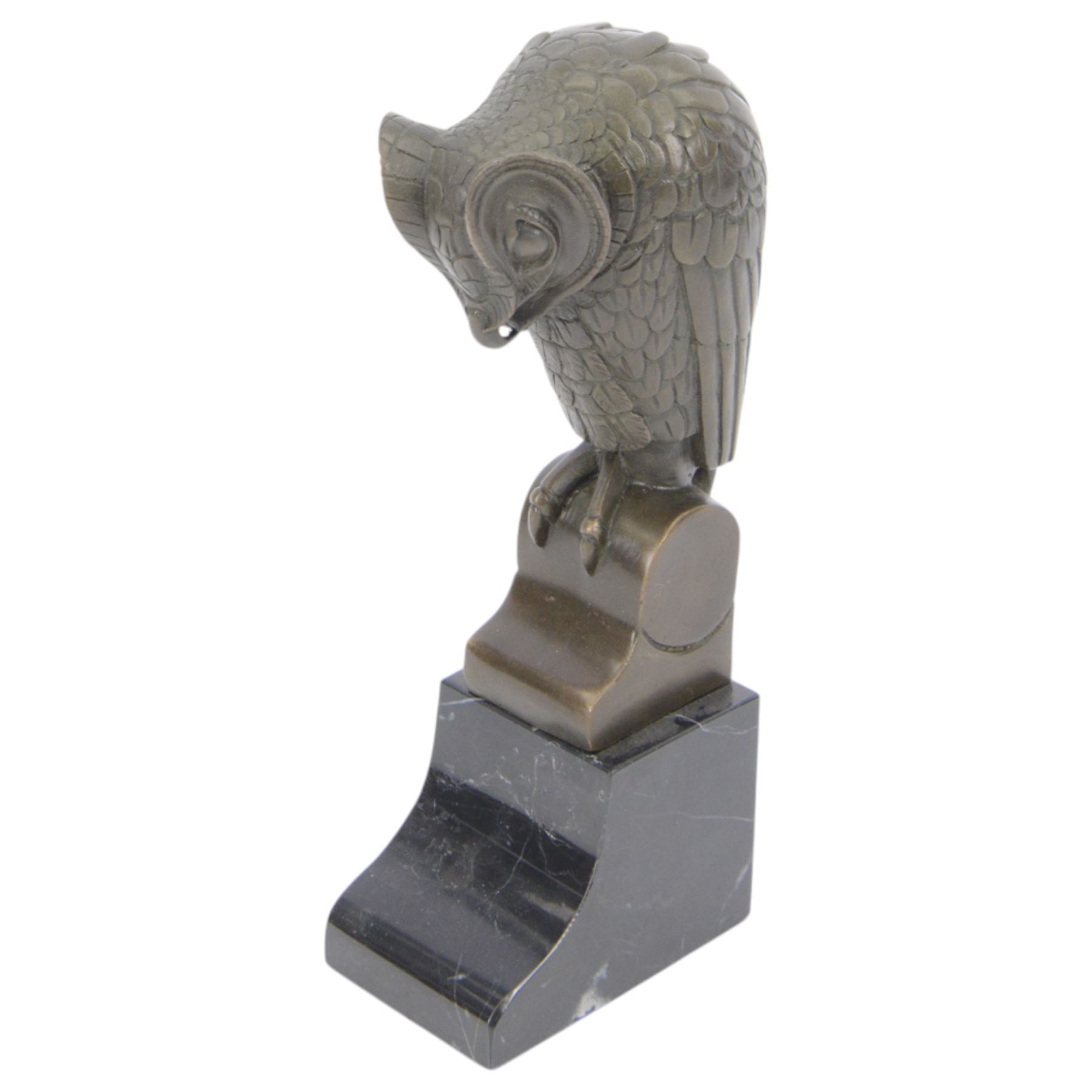 Bronze figure of a stylised eagle owl upon a marble base, H25cm 