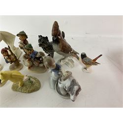 Group of figures to include Goebel Hummel, Royal Doulton Pyroeis and Winnie the Pooh, Lladro etc