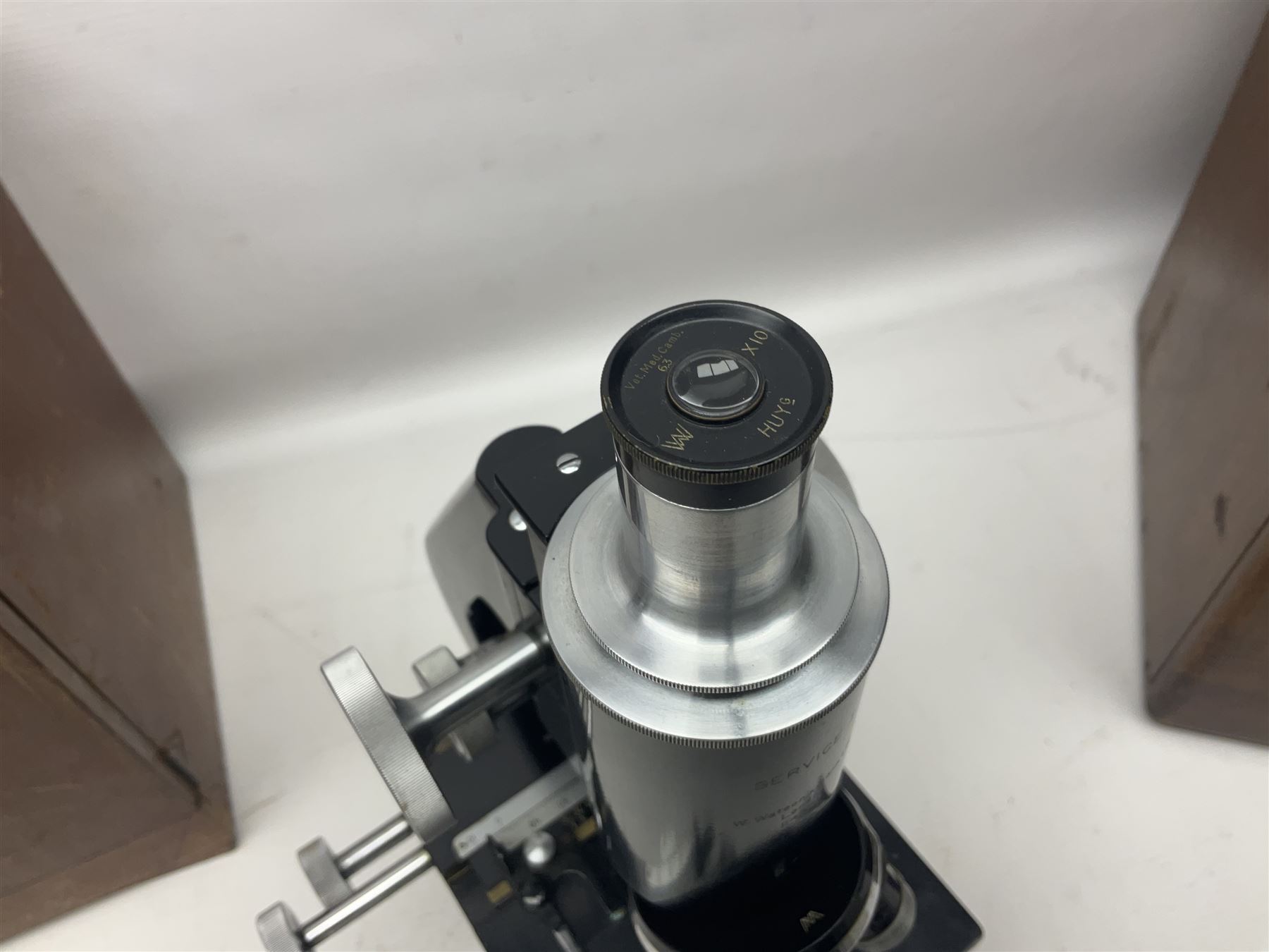 Four microscopes, including Cooke, Troughton & Simms no M467926, W Watson & Sons no 114758, W & J George & Beck Ltd no 36649 and one other 