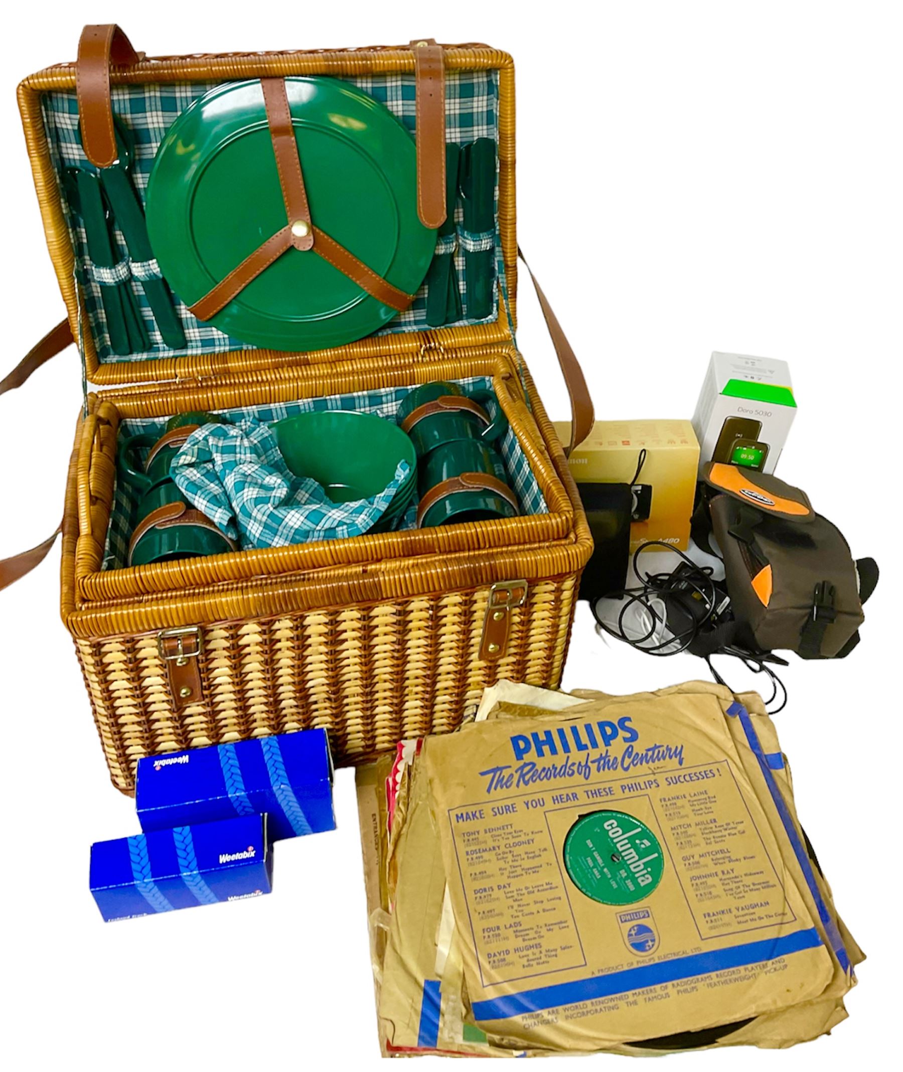 Canon Powershot A480 digital camera, in box, together with a Panasonic SDR-H86 digital video camera, Doro 5030 mobile phone, pair of Jessops Field Binoculars, two Weetabix diecast model cars, wicker picnic basket with plastic picnic ware and a collection of vinyl records
